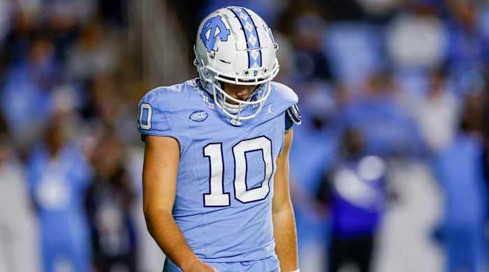 UNC quarterback Drake Maye hangs his head during loss to Virginia